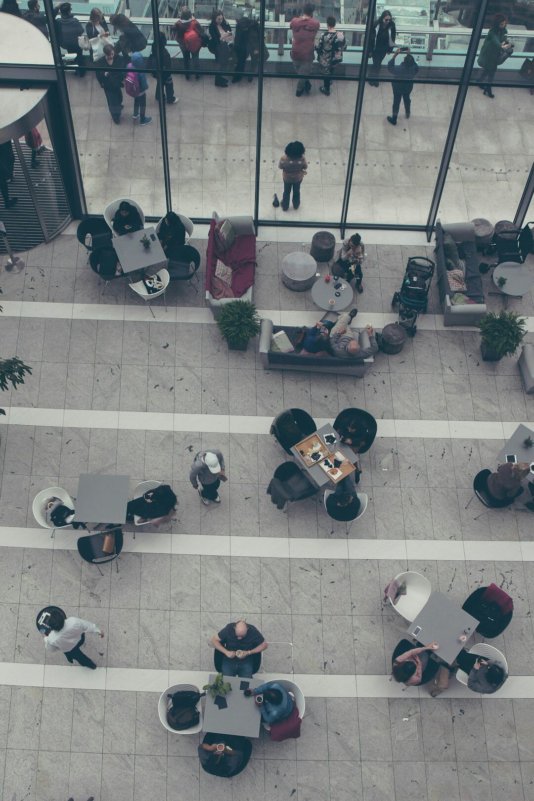 Group of business professionals discussing documents around a table